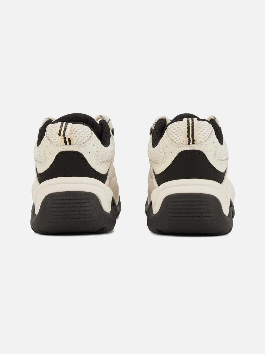 Rear view of TALISHKO sports casual shoes, highlighting the black and beige color contrast.