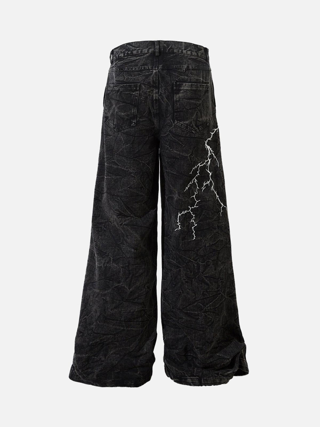 Back view of TALISHKO distressed hip-hop jeans with bold white lightning detail.