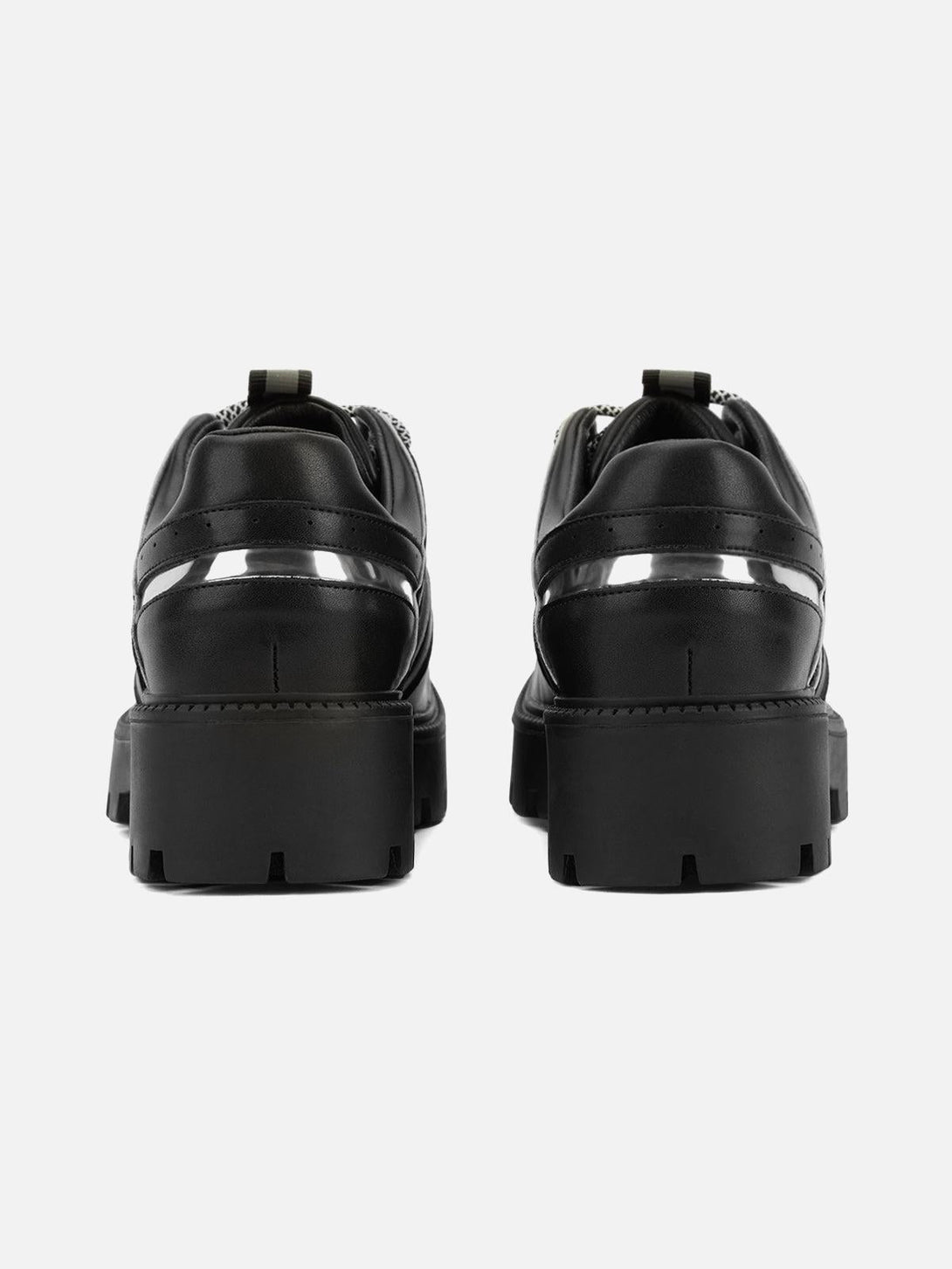 Rear angle of TALISHKO leather shoes with glossy metal accents and chunky soles.