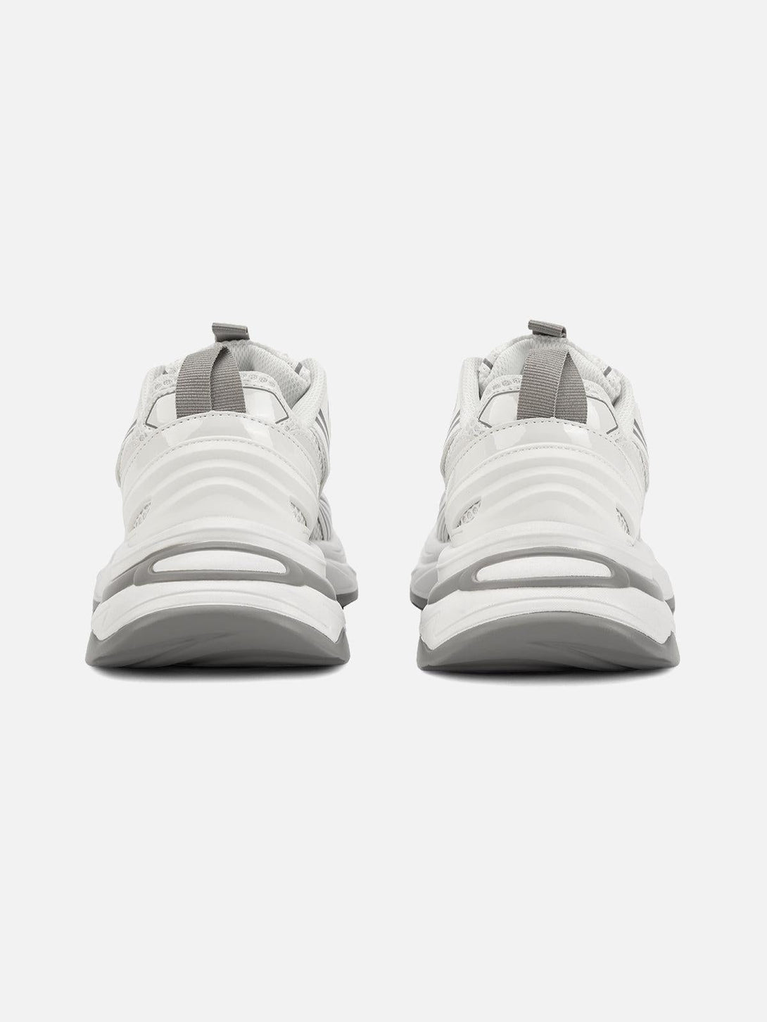 Back view of white TALISHKO casual sneakers, highlighting sleek design and modern style.