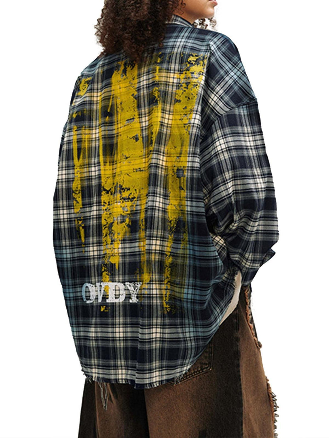 Back view of a plaid shirt with yellow spray print by TALISHKO, adding an edgy urban touch.