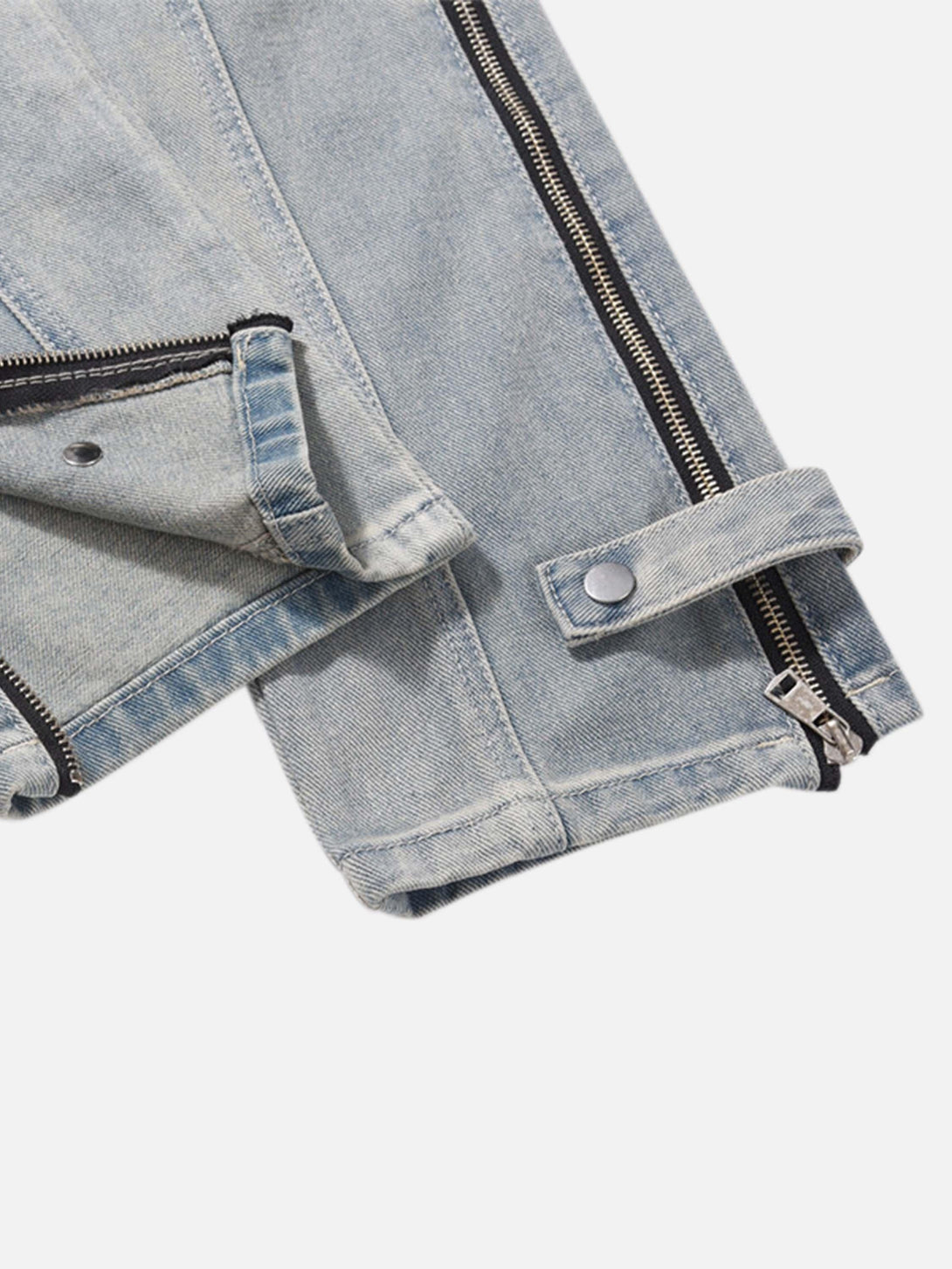 A close-up of TALISHKO jeans showcasing the zipper and button details in hip-hop style.