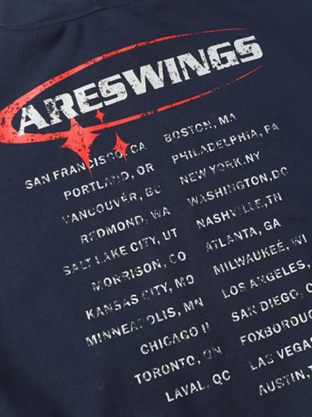 Back view of TALISHKO hoodie featuring distressed red and white lettering with city names.