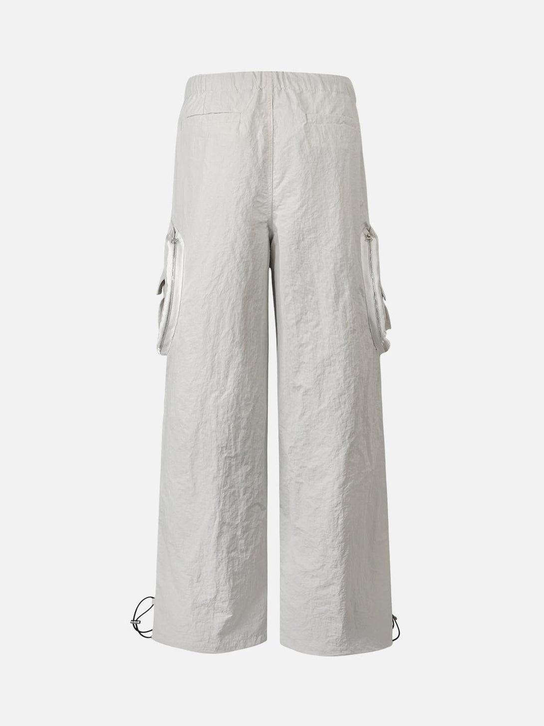 Back view of TALISHKO cargo pants in white, showcasing a relaxed fit with multiple pockets.