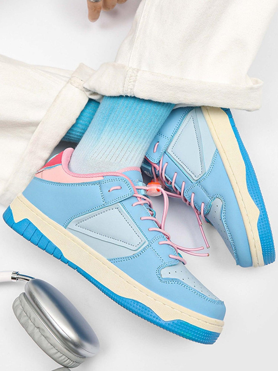 TALISHKO skate shoes in pastel blue and pink, styled with ombre socks and white denim.