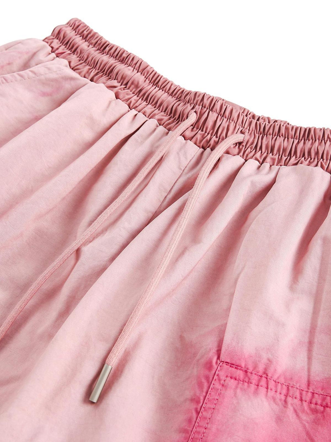 A tight crop highlighting TALISHKO pink casual shorts' elastic waistband and drawstring detail.
