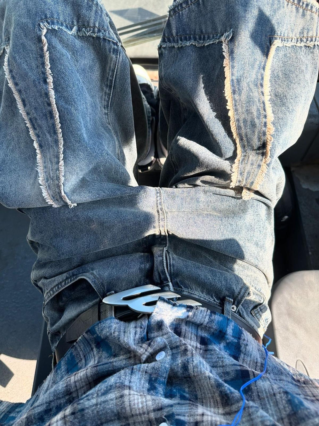 TALISHKO star-patterned jeans with distressed details and a casual, relaxed fit.