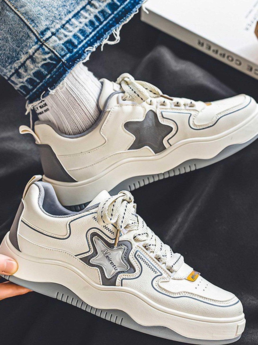 TALISHKO board shoes in white with star accents and chunky soles, ideal for casual wear.