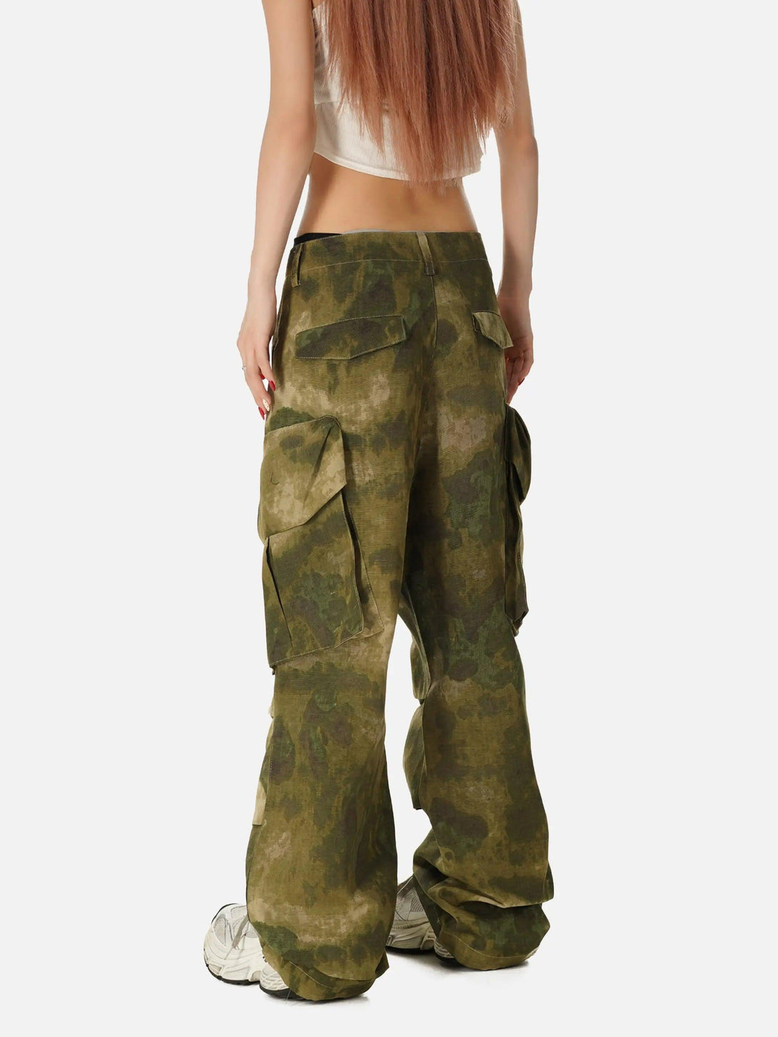 Back view of TALISHKO camouflage overalls, featuring a relaxed fit and utilitarian pockets.