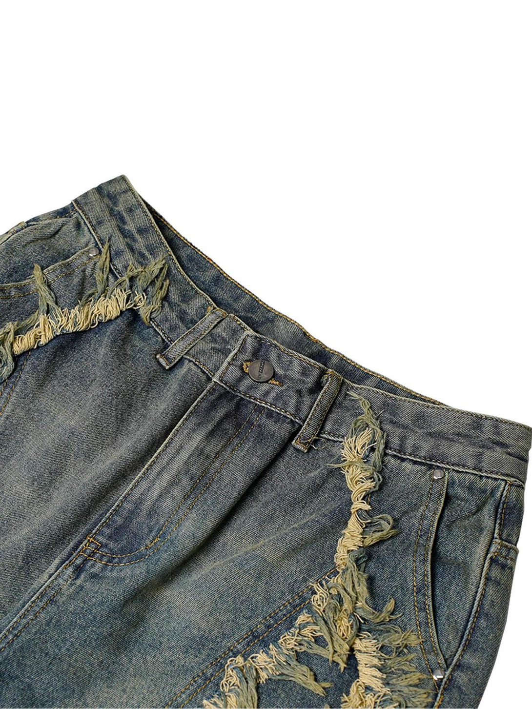 Focusing on the intricate distressed details of TALISHKO denim shorts for a chic summer vibe.