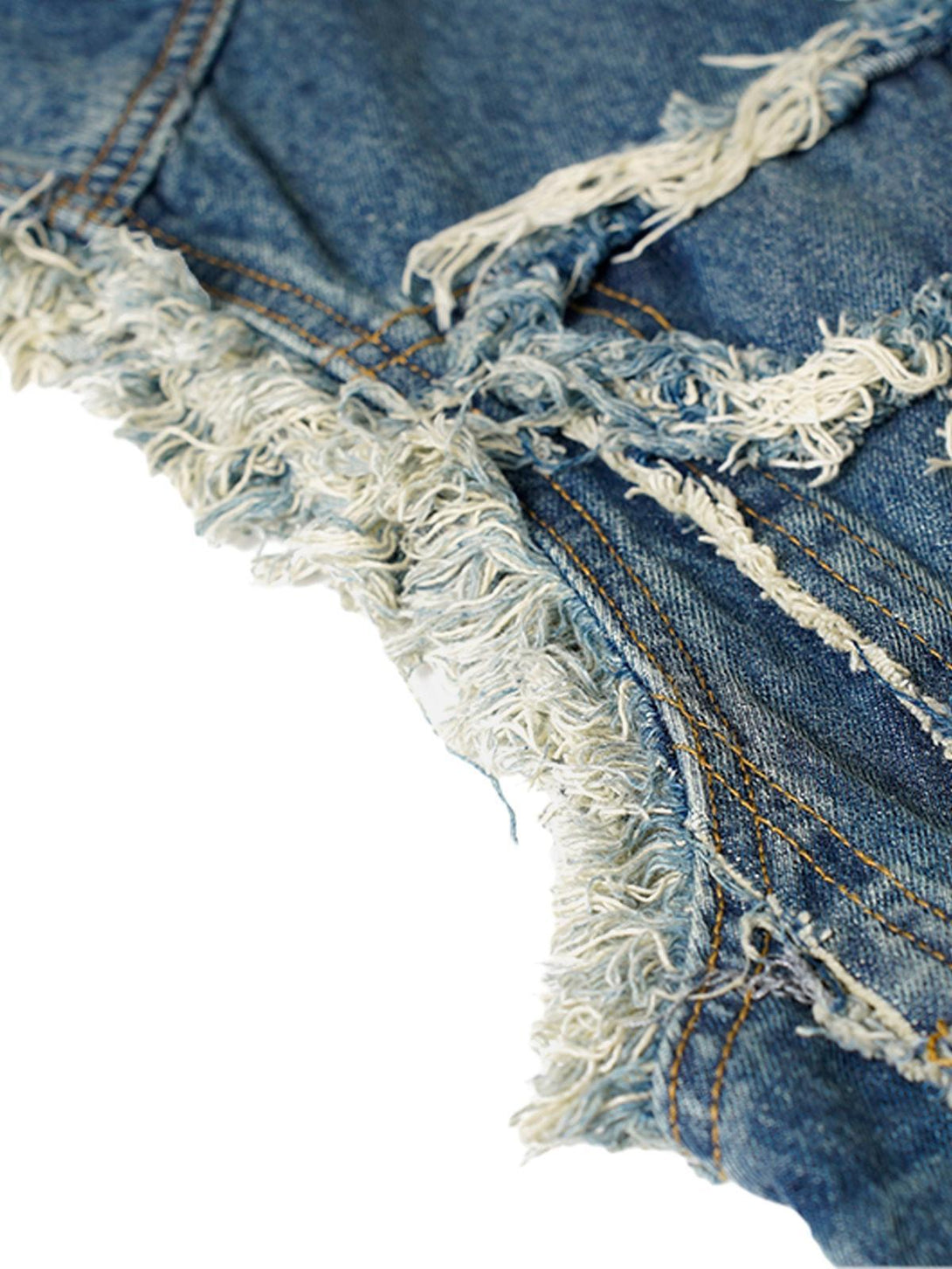 A detailed view of the raw edge denim texture on a vest, capturing the casual vibe by TALISHKO.