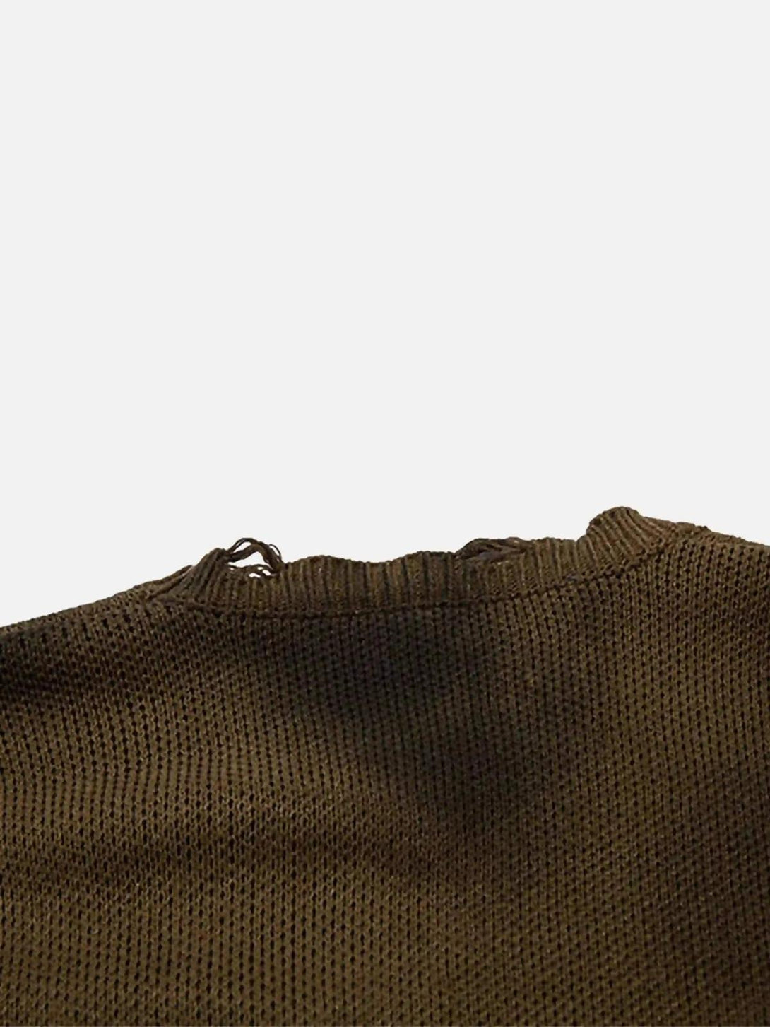 A close-up of the TALISHKO sweater's distressed neckline, showcasing its unique texture.