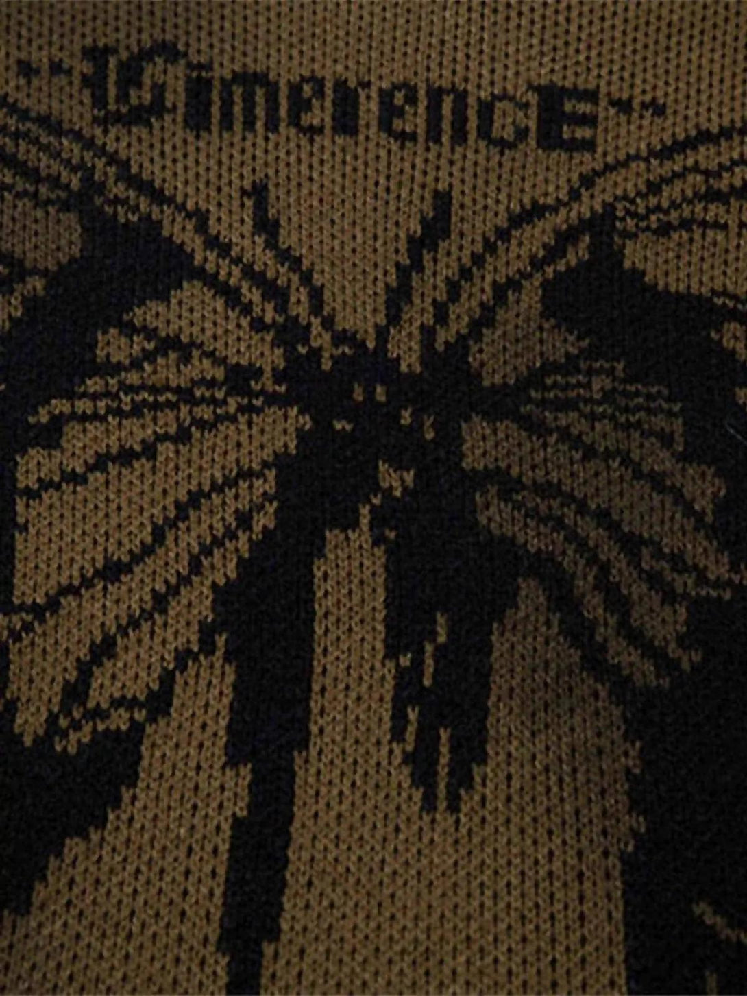 Intricate look at the butterfly jacquard pattern on a TALISHKO sweater, highlighting unique texture.
