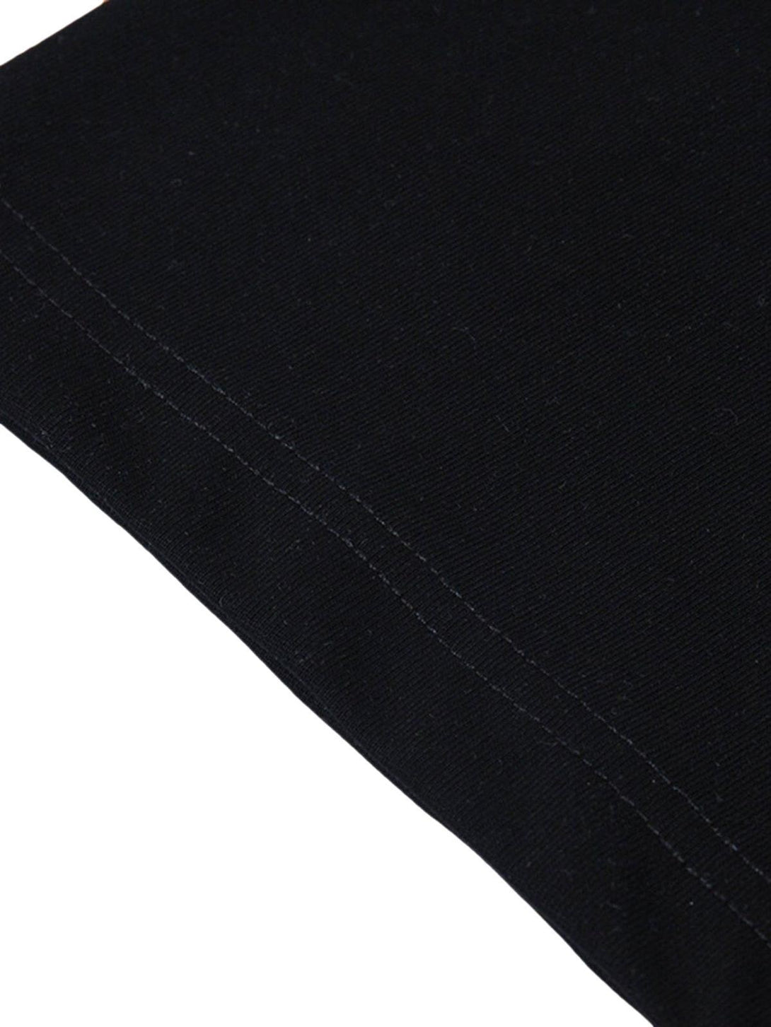 Detailed fabric and stitching on a black hip-hop T-shirt by TALISHKO, showcasing casual style.