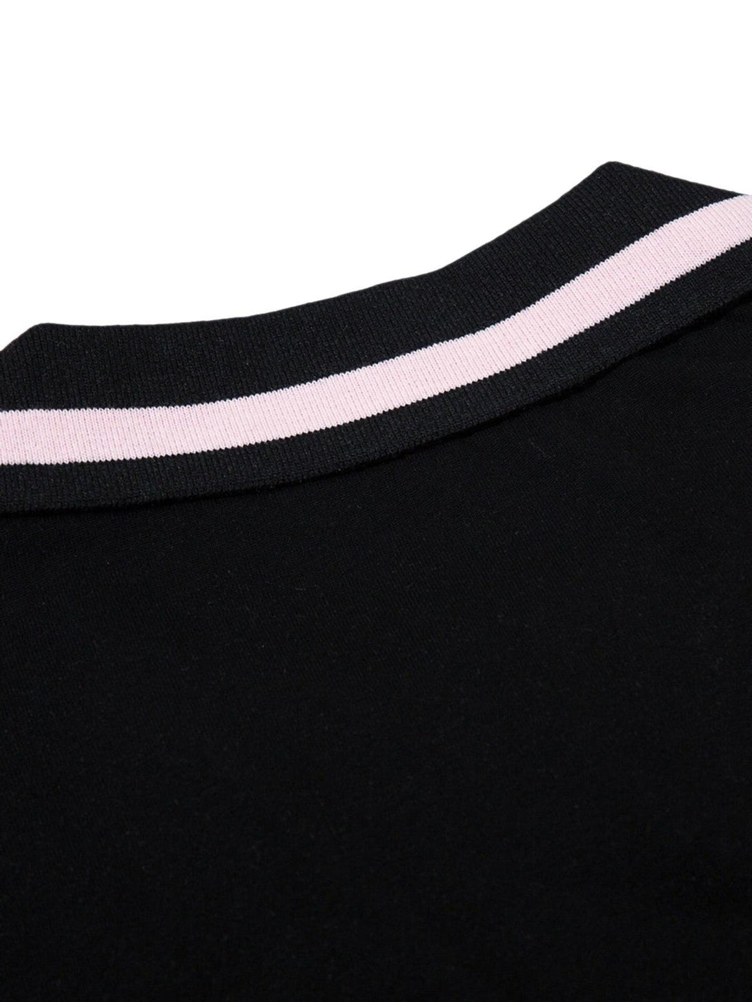 A close-up of the collar on a TALISHKO T-shirt, featuring a stylish black and pink design.