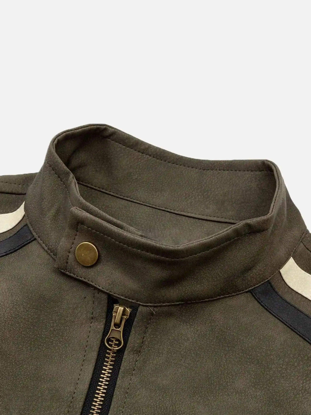 Intricate look at the collar and zipper detail of a hip-hop motorcycle jacket by TALISHKO.
