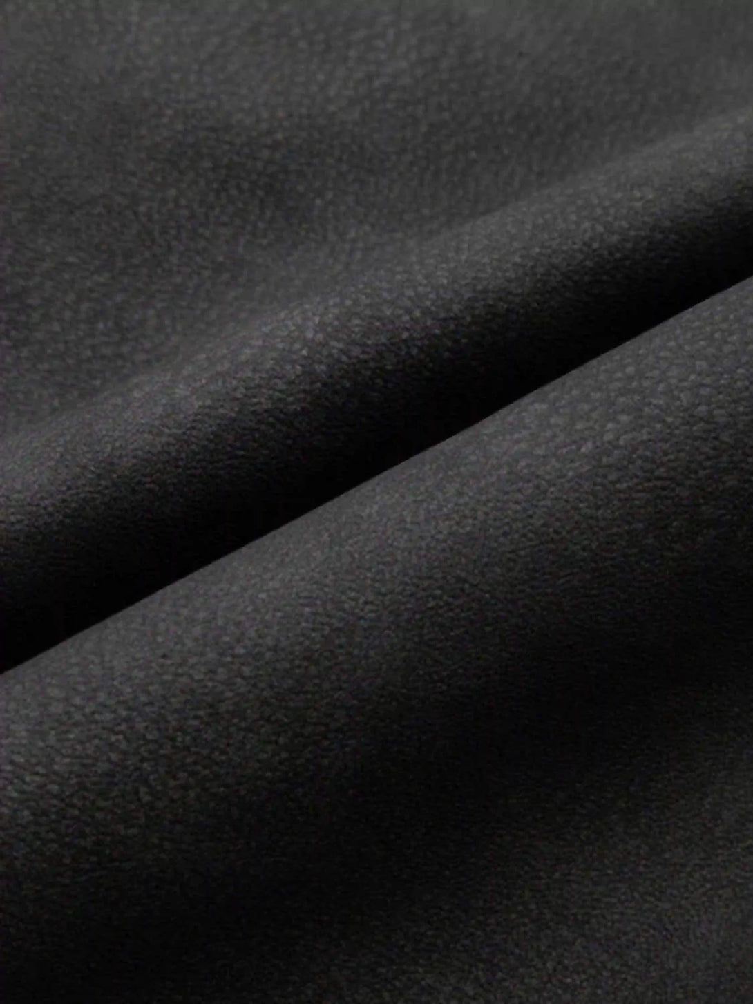 Texture and pattern showcased in TALISHKO's hip-hop motorcycle trend jacket fabric.