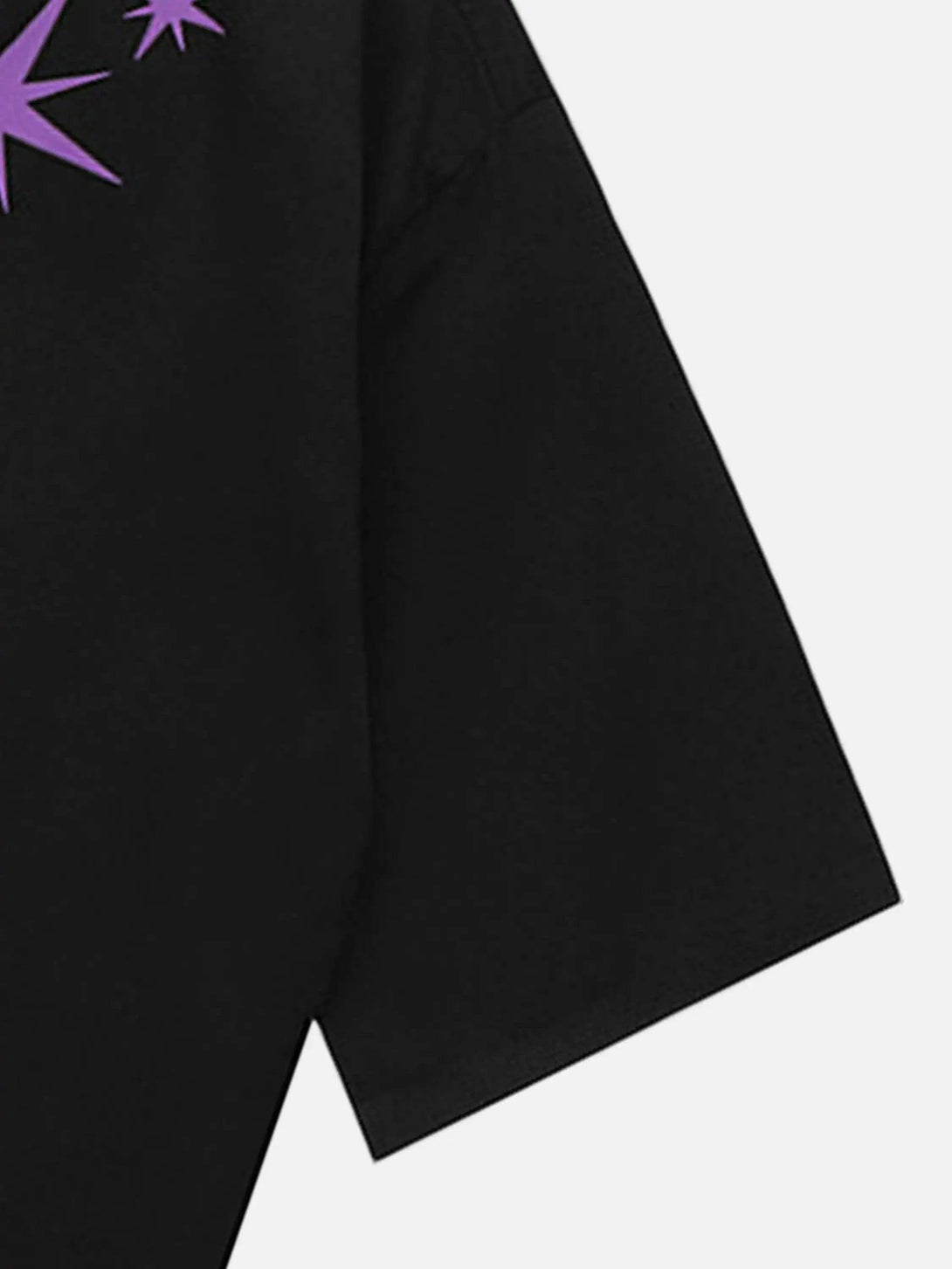 A close-up of the purple star design on a black hip-hop shirt by TALISHKO, highlighting the sleeve detail.