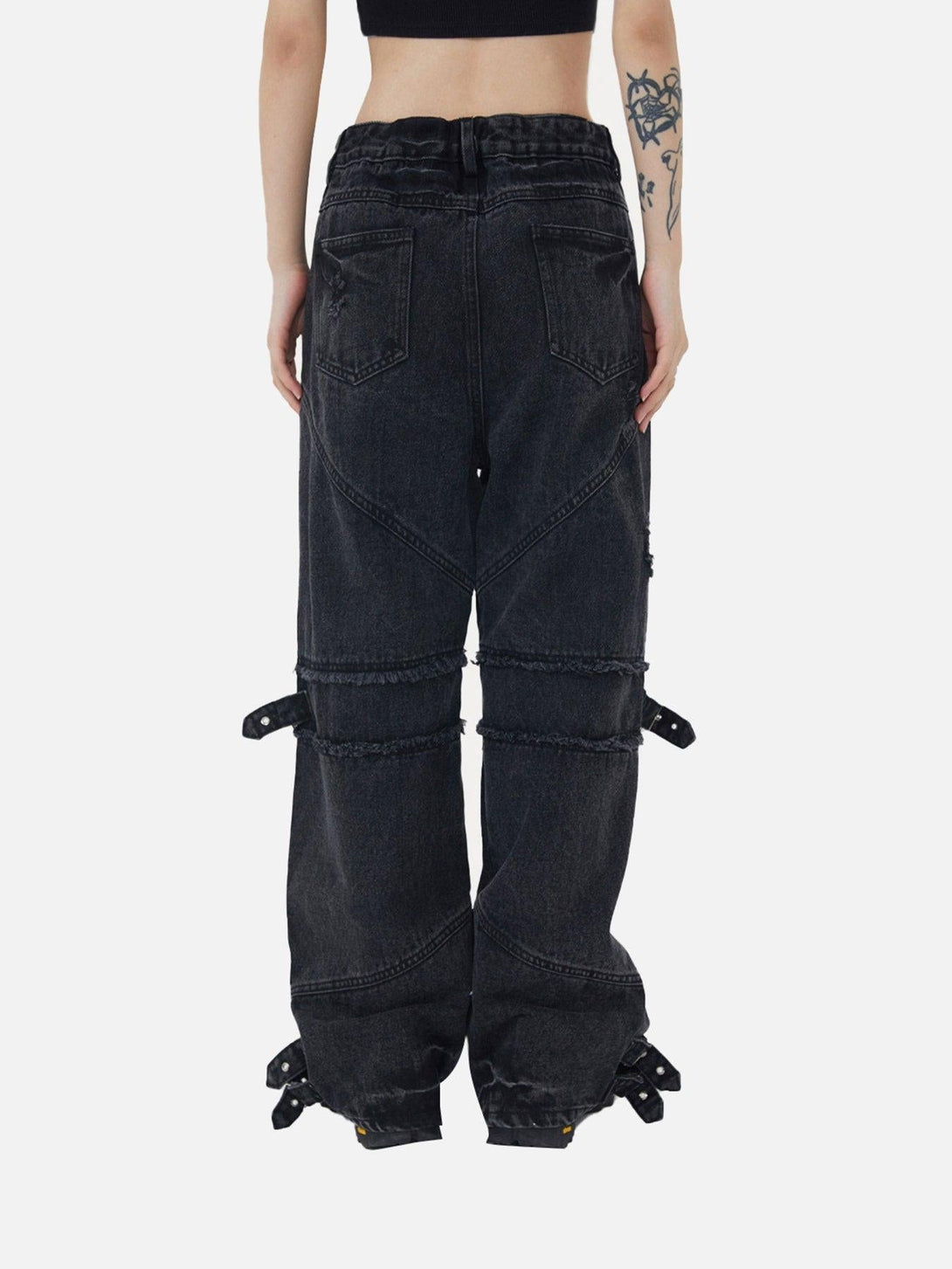 Back view of TALISHKO hip-hop retro wash denim pants with unique buckle details and straight-leg fit.