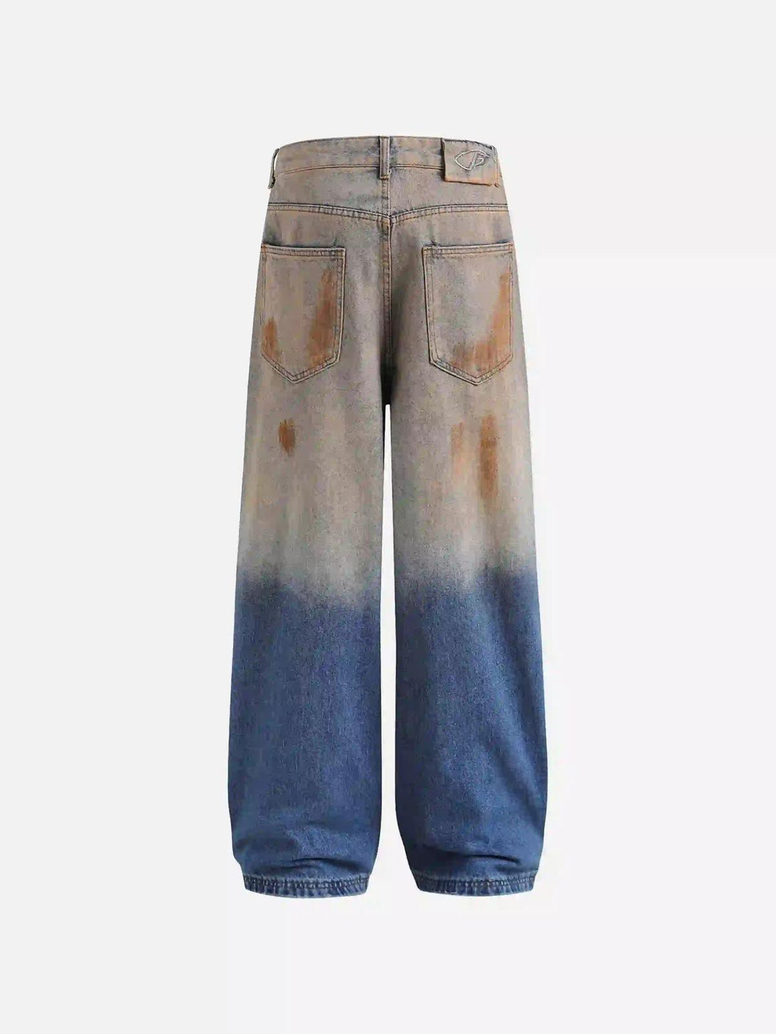 Back view of hip-hop mud-dyed jeans by TALISHKO, showcasing unique faded color design.