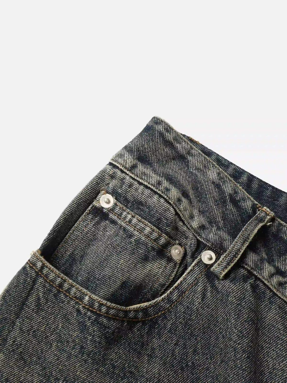 Focusing on the rugged texture of TALISHKO graffiti jeans, showcasing urban street style details.