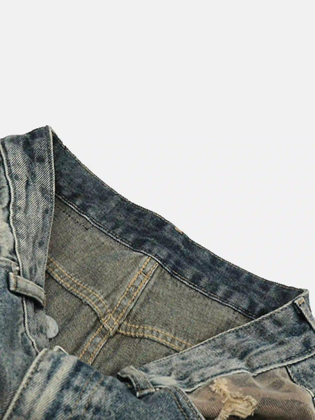 Focusing on TALISHKO's hip hop jeans, highlighting distressed denim and camo patch details.