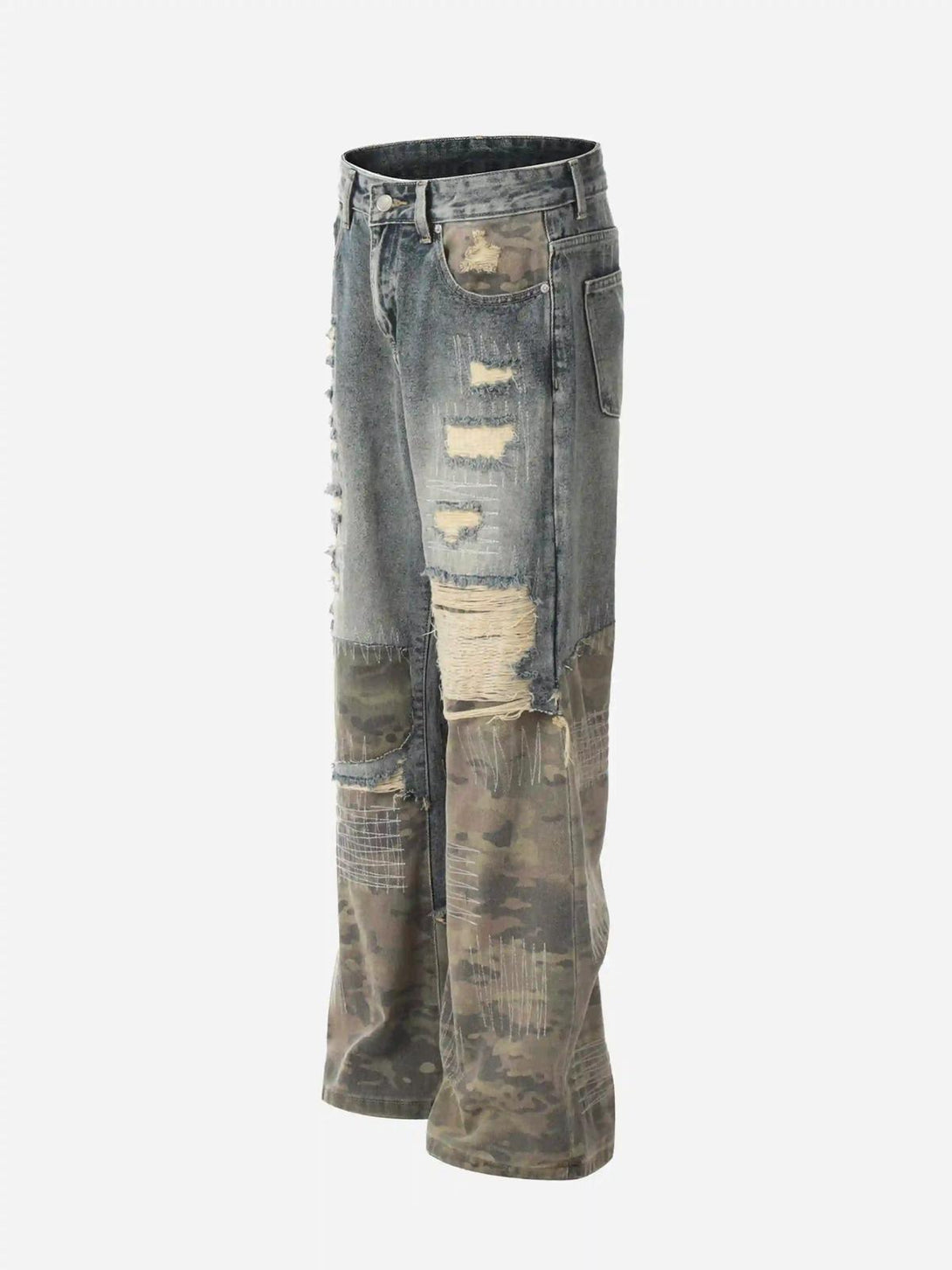 Side view of TALISHKO's hip hop jeans with distressed denim and camo patchwork detailing.