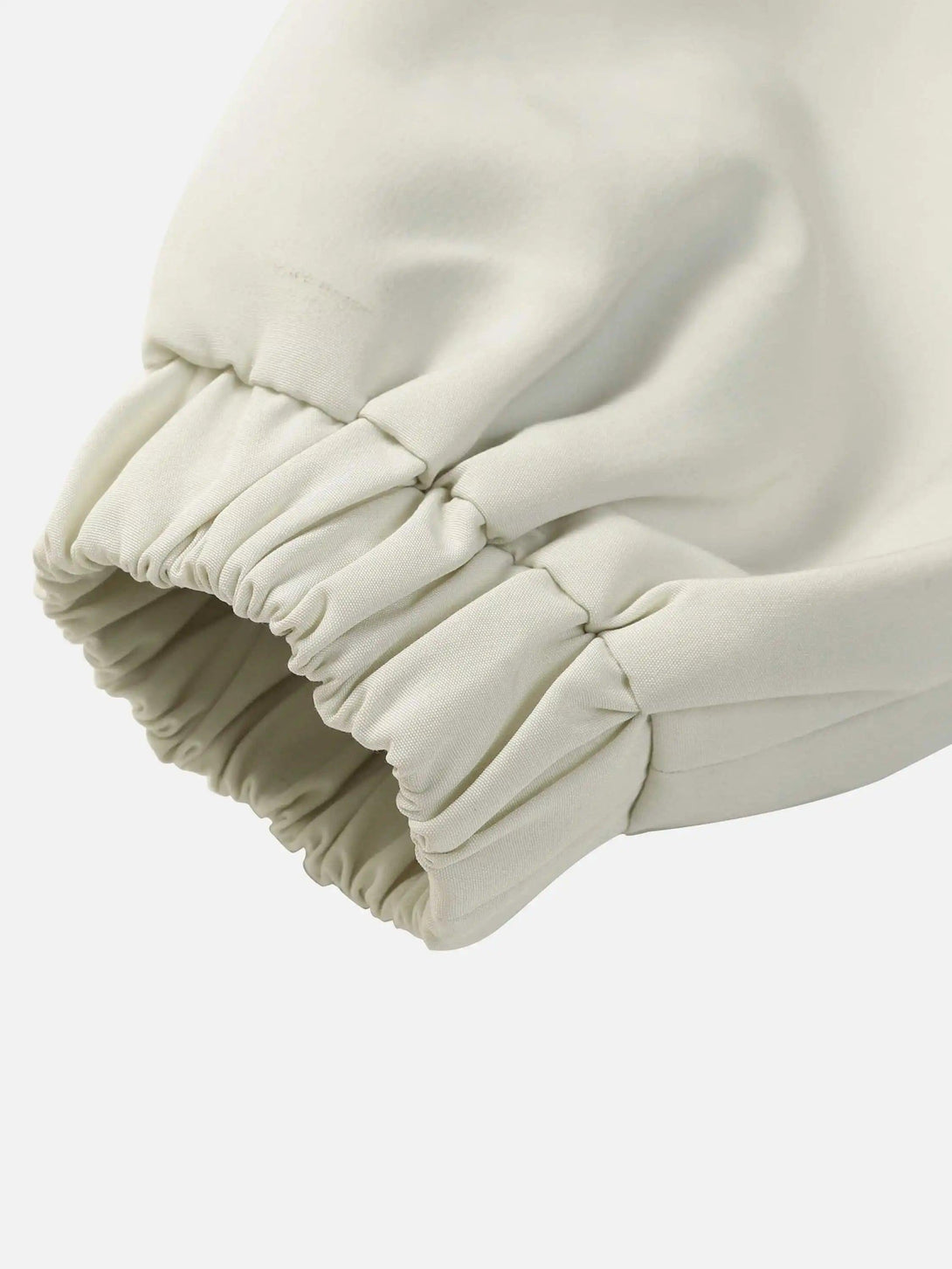 A detailed view of the elastic cuff on a TALISHKO jacket, highlighting its stylish design.