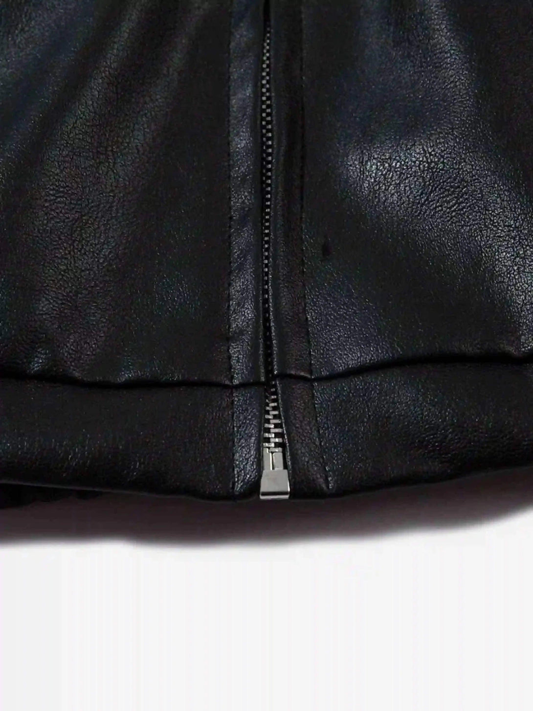 A close-up of TALISHKO's PU motorcycle jacket, highlighting the smooth texture and zipper detail.