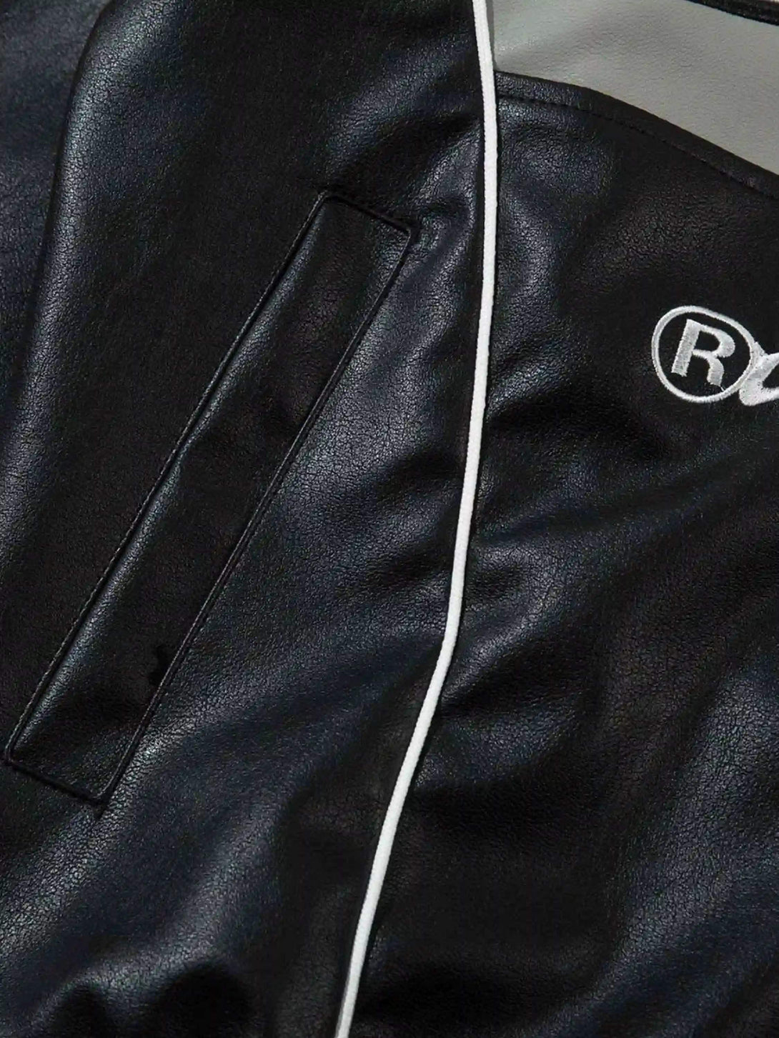 Detailed look at TALISHKO's PU motorcycle jacket, highlighting sleek stitching and texture.