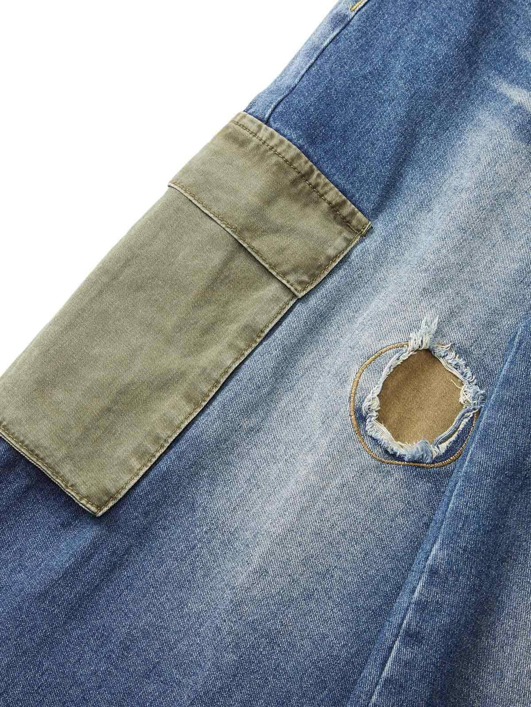 Intricate look at TALISHKO cargo jeans, showcasing a large pocket and distressed denim detail.
