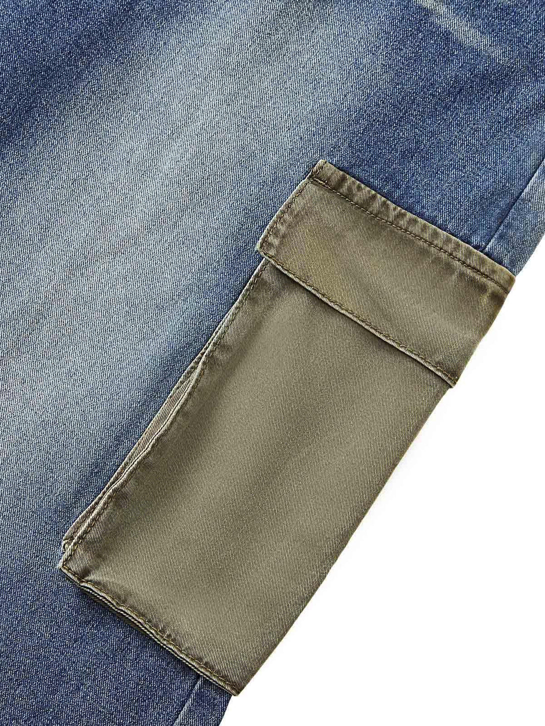 Detailed view of TALISHKO cargo jeans, focusing on the large pocket and contrasting textures.
