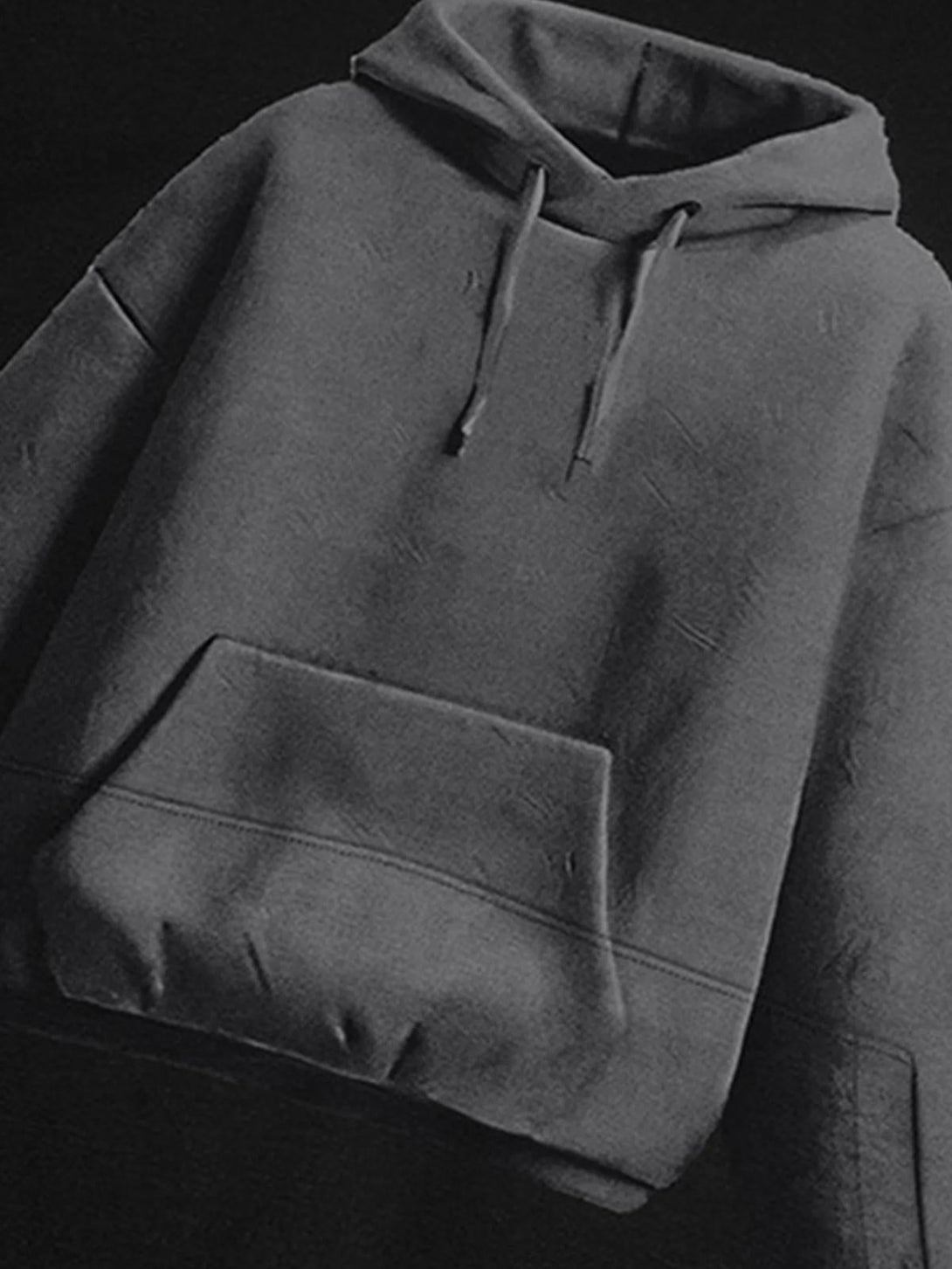 TALISHKO hoodie with a unique pattern design, showcasing its cozy texture and relaxed fit.