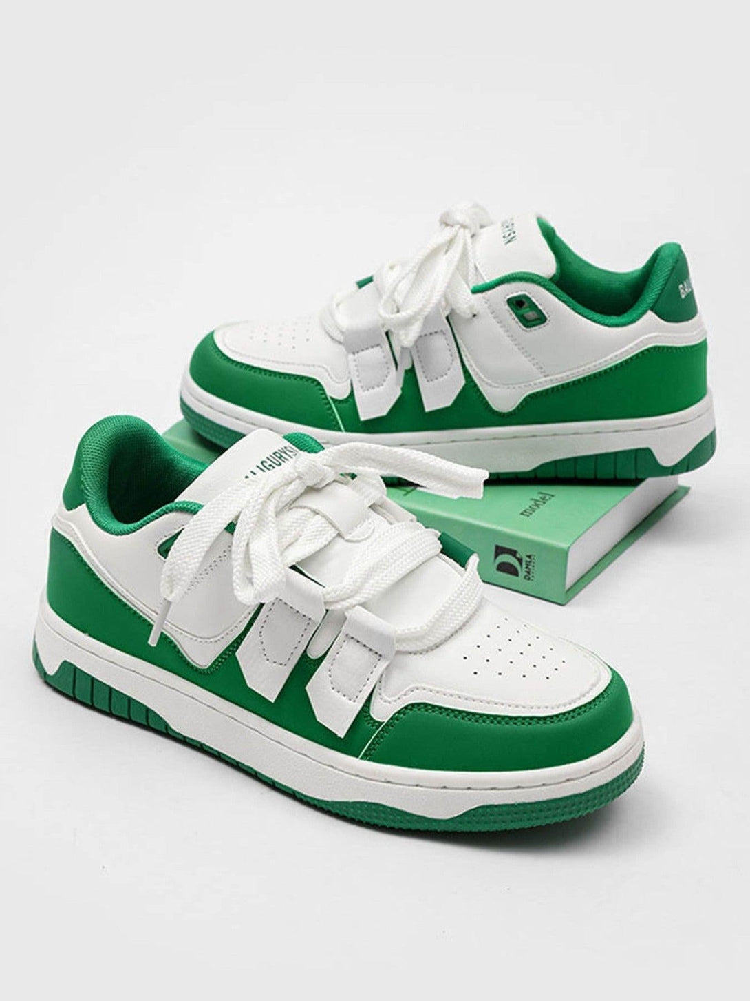 TALISHKO green and white board shoes, side view highlighting sporty casual design.