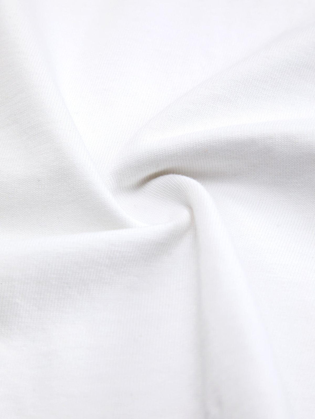 A close-up of TALISHKO T-shirt fabric, highlighting the soft texture and weave detail.