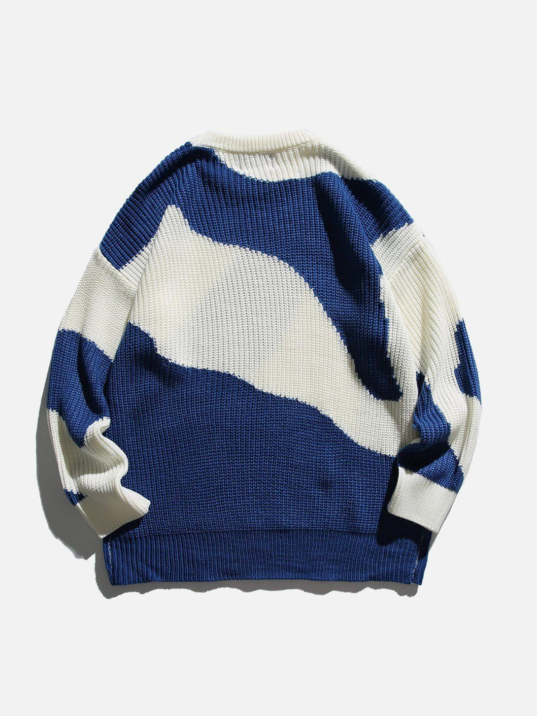 Back view of a blue and white abstract knit sweater by TALISHKO, showcasing bold design.