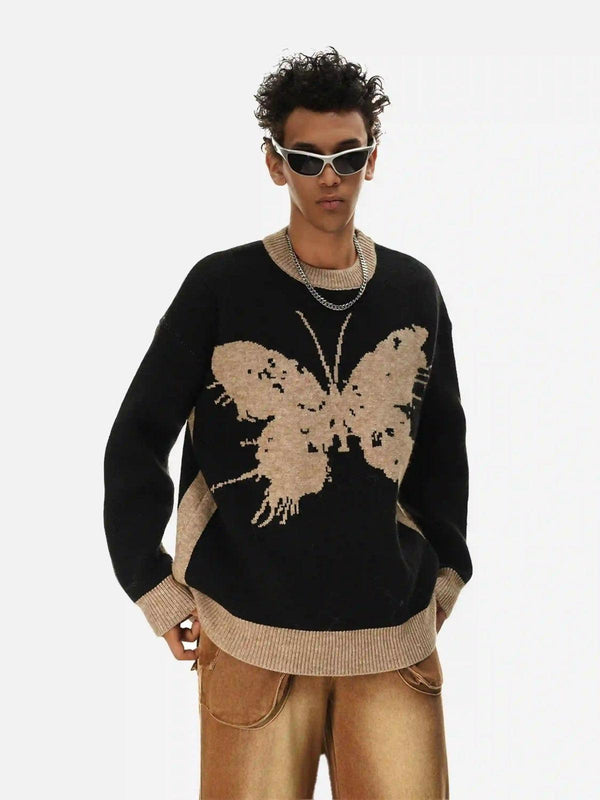 Model wearing a stylish TALISHKO jacquard butterfly sweater with bold design and unique flair.