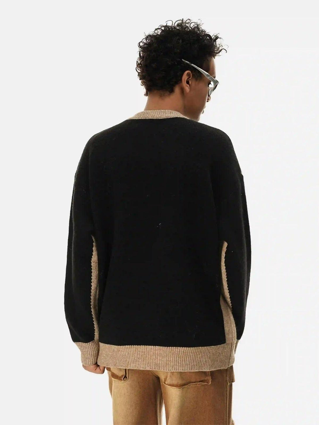 Back view of TALISHKO jacquard butterfly sweater, featuring contrasting beige accents.