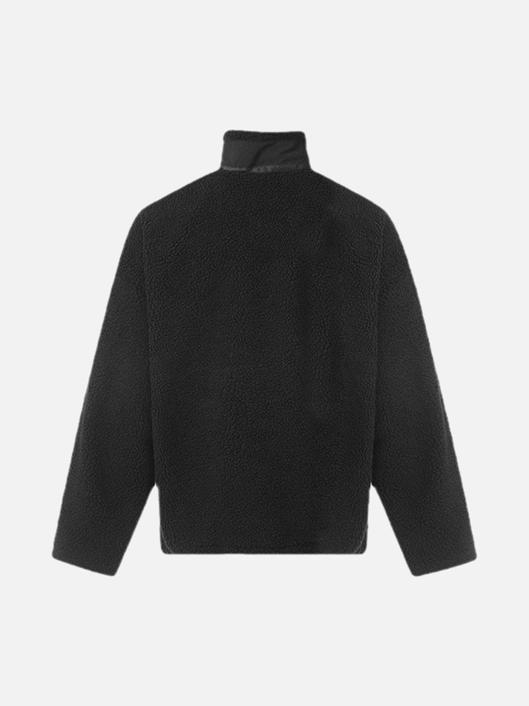 Back view of a black sherpa jacket by TALISHKO, highlighting the stand collar design.