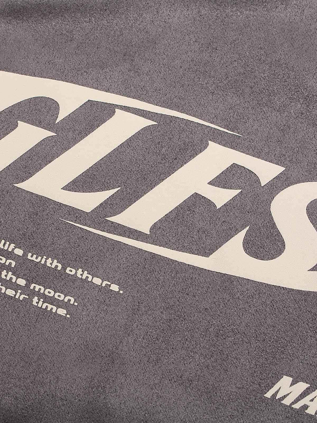 Intricate look at TALISHKO T-shirt's print and texture, showcasing unique design details.