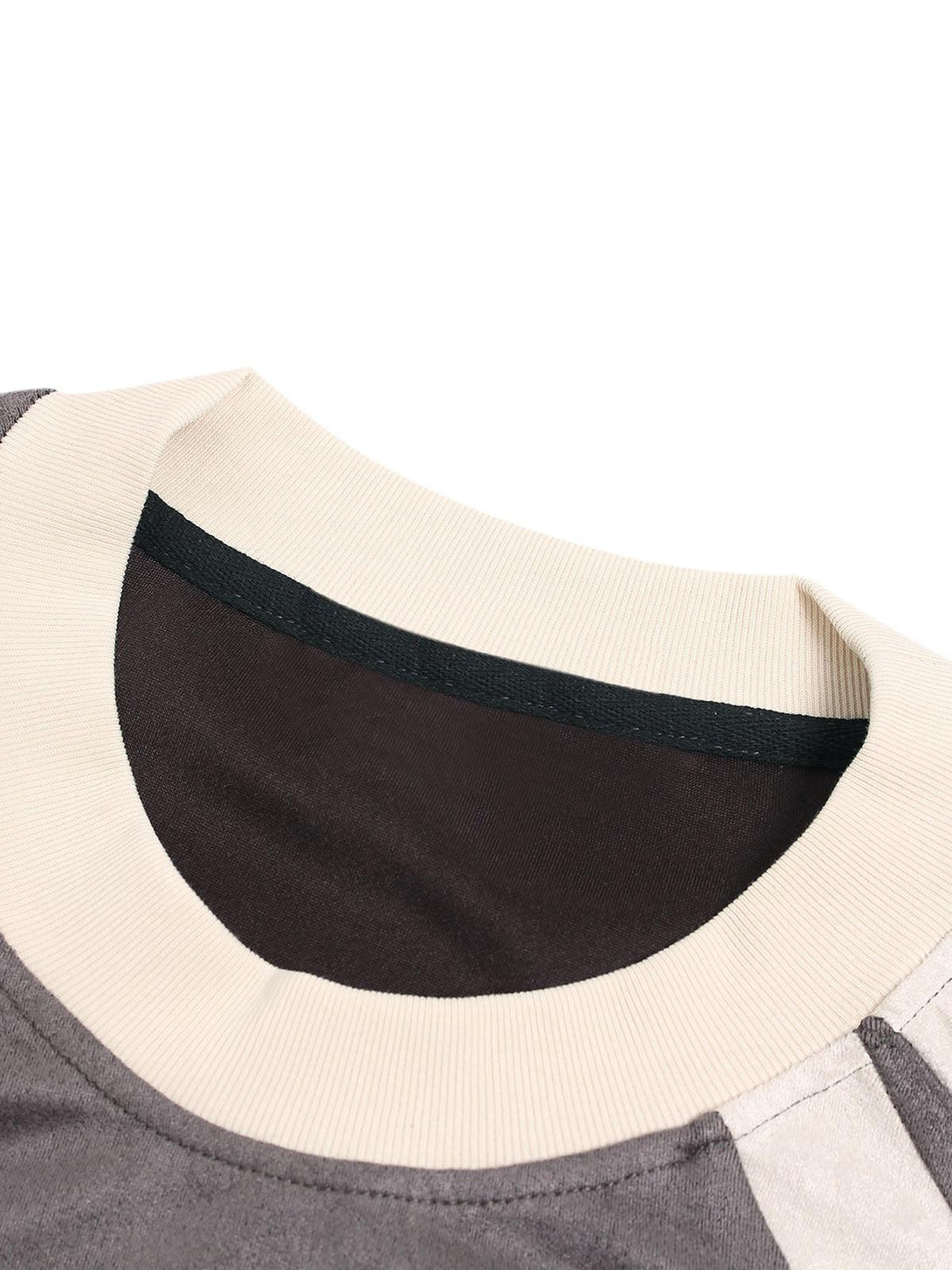 Close-up of TALISHKO T-shirt's neckline, featuring deconstructed contrast color stitching.