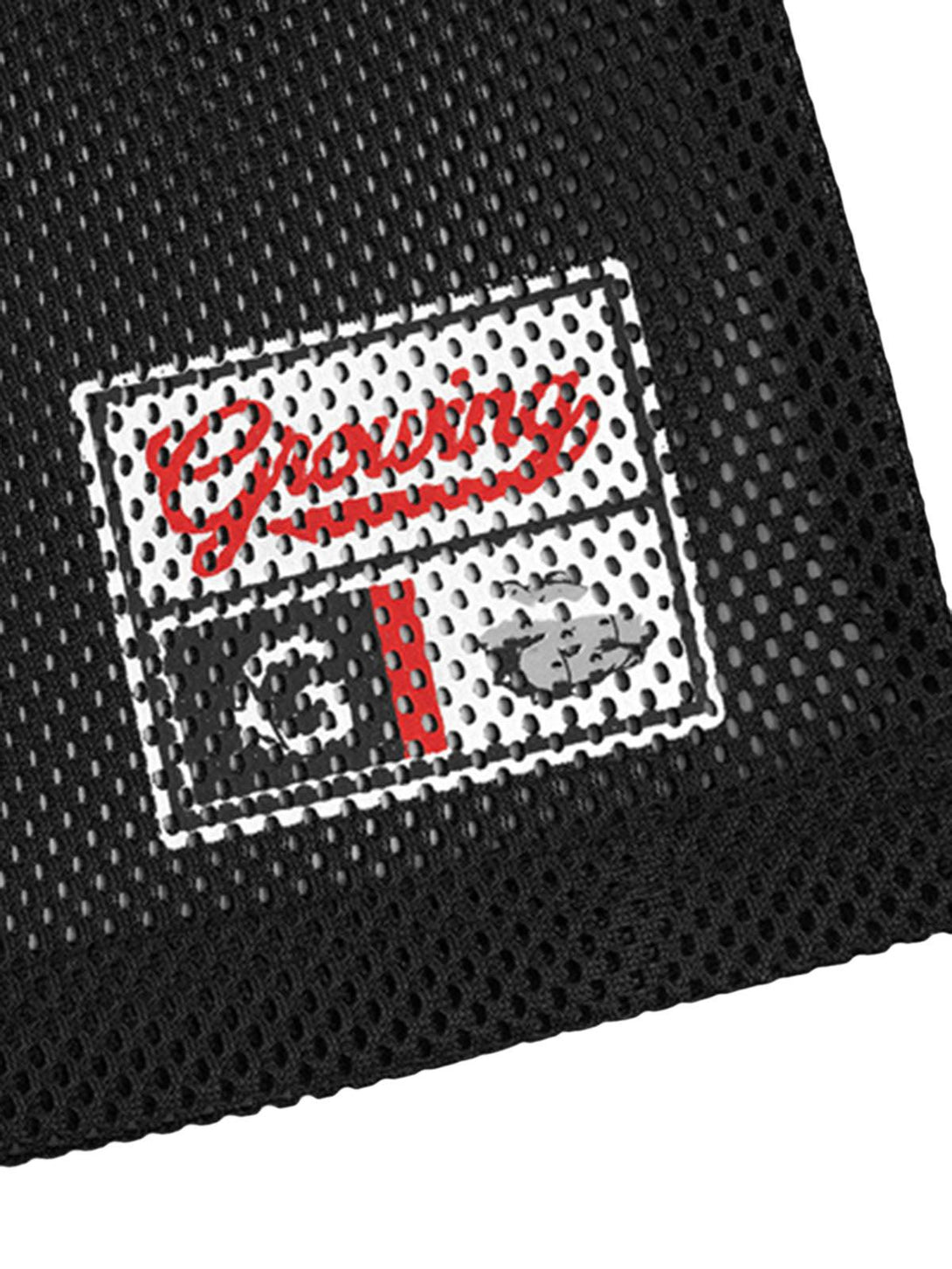 Detailed view of black mesh fabric with vibrant patch design by TALISHKO, emphasizing texture.