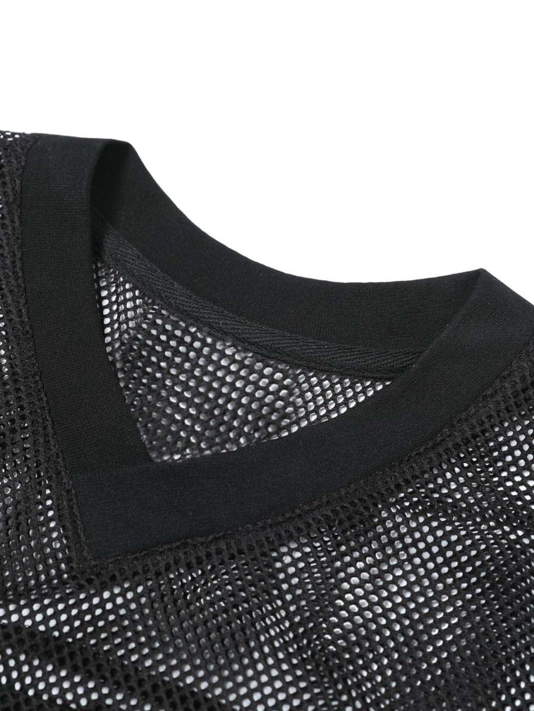Intricate look at TALISHKO's black mesh fabric and neckline of the hollow T-shirt.