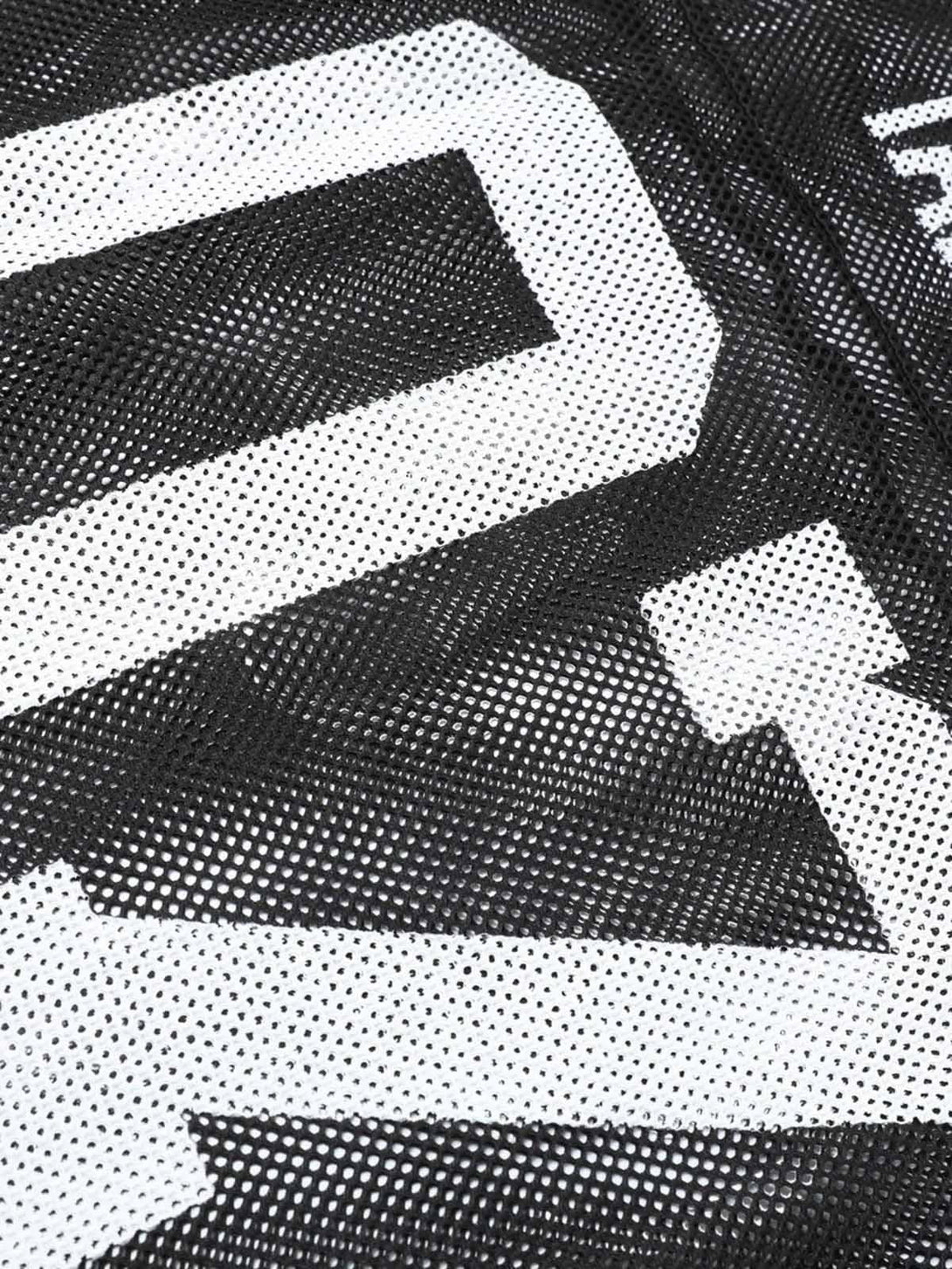 A detailed view of TALISHKO's black mesh jersey with "TAELEPLUS 07" design, showcasing texture.