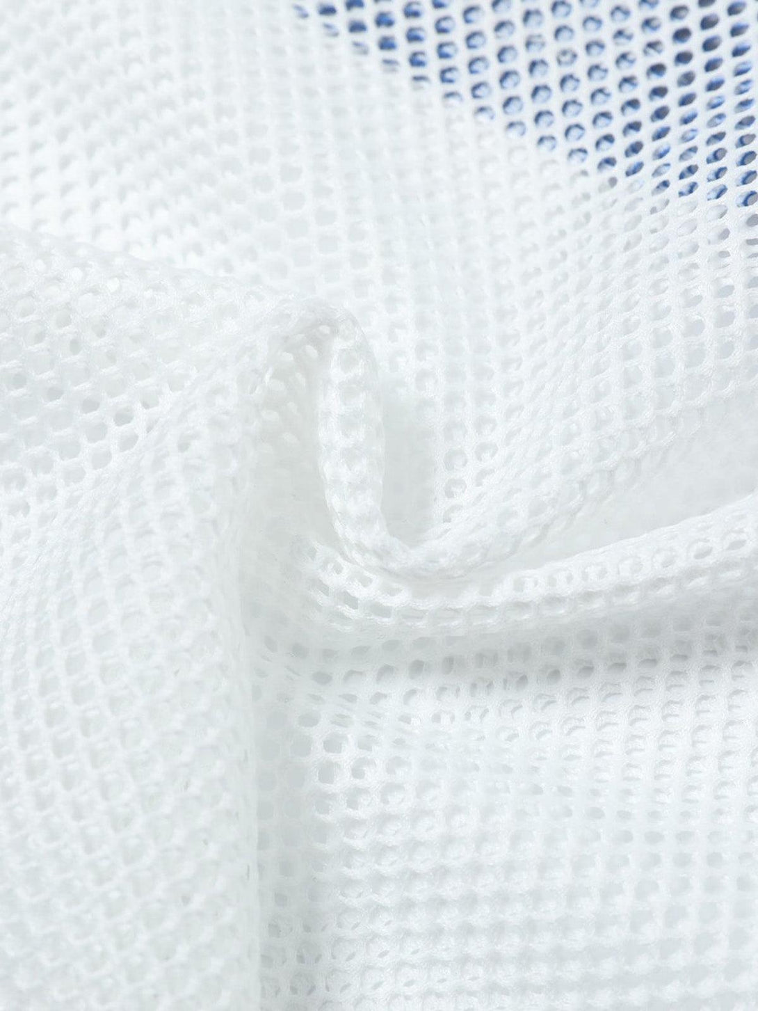 Focusing on the breathable texture of TALISHKO's white jersey mesh fabric in this close-up.