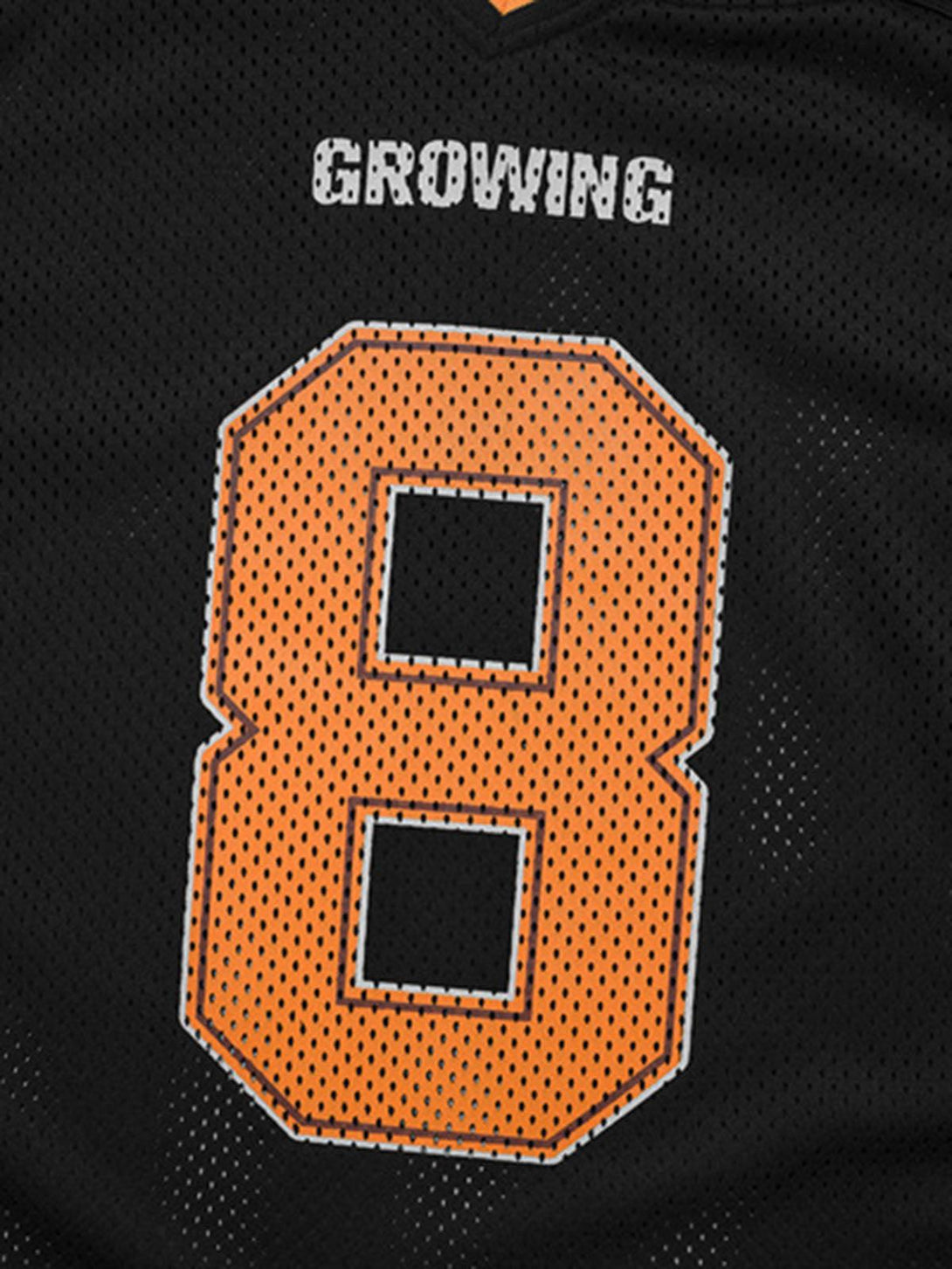 A detailed view of TALISHKO's oversized jersey T-shirt, featuring bold orange number eight.