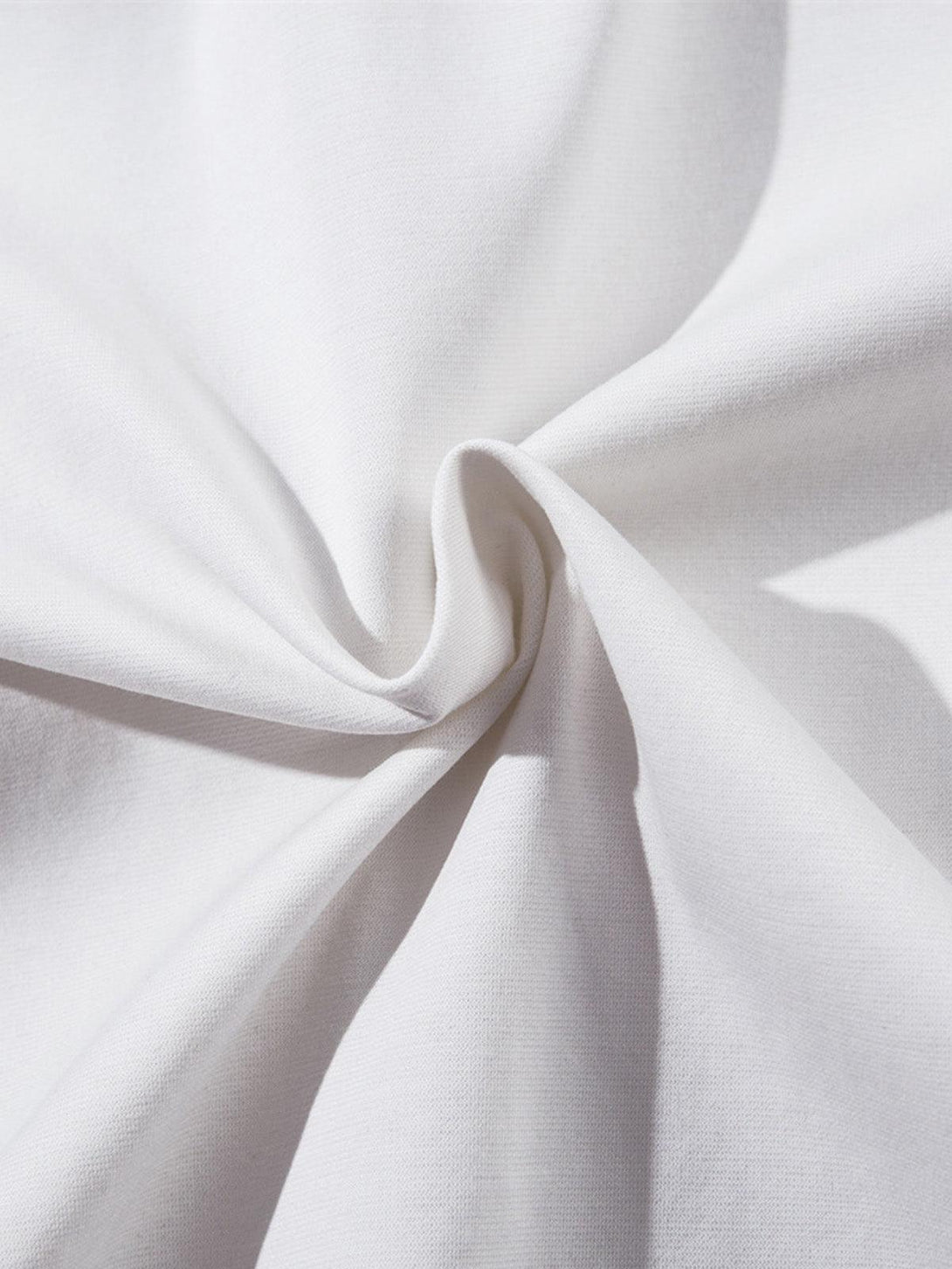 Zoomed-in texture of TALISHKO's jersey fabric, showcasing smooth and high-quality material.