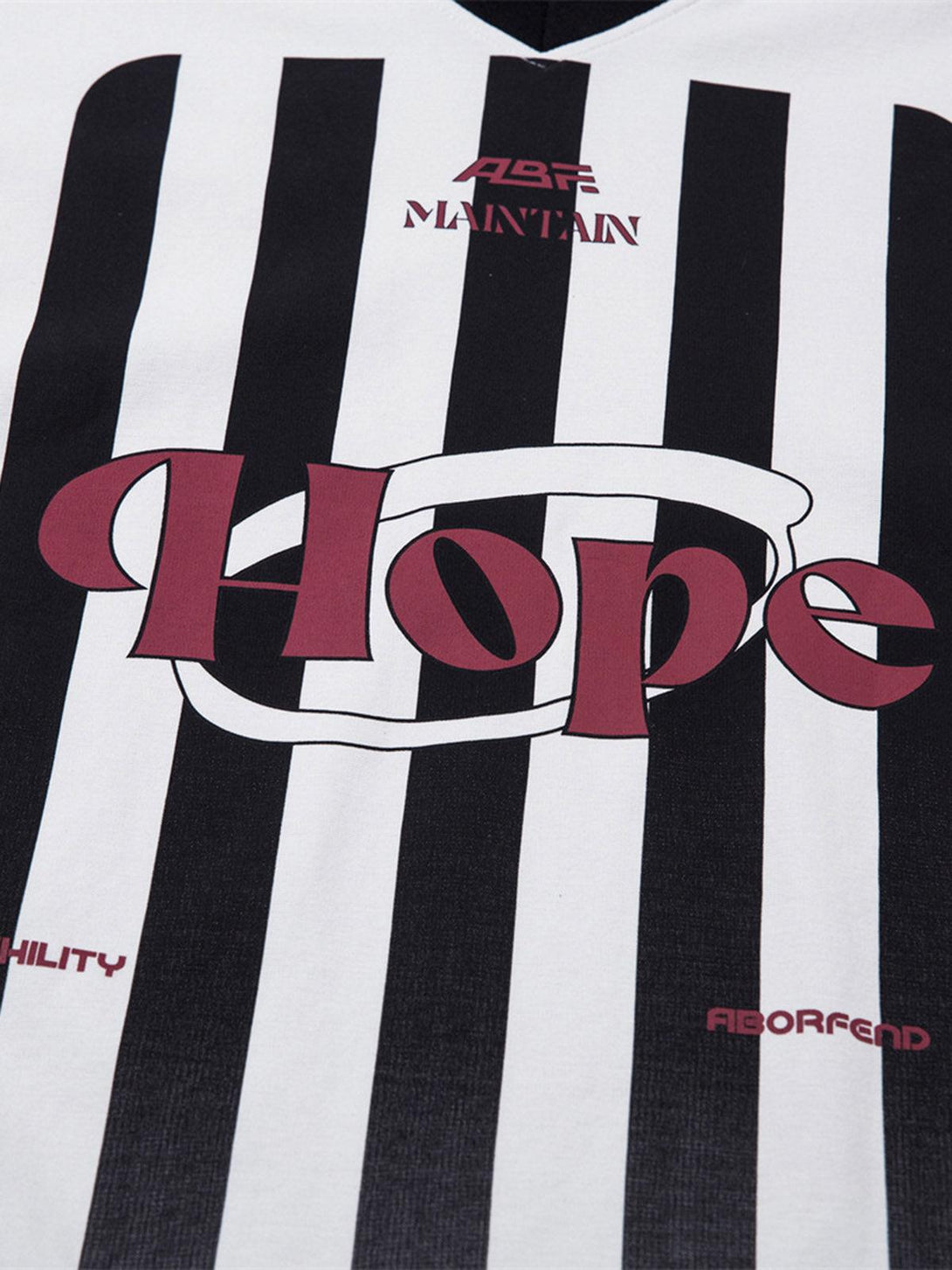 TALISHKO jersey polo shirt with black and white stripes, featuring bold "Hope" graphic detail.