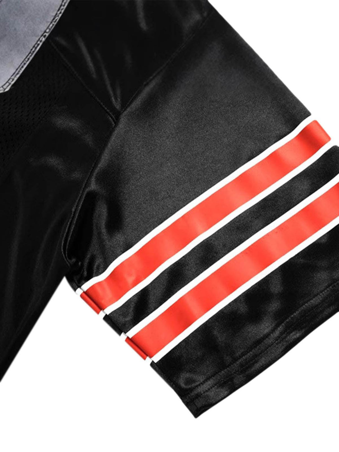 Close-up of TALISHKO jersey's sleeve with red and white stripes, showcasing sporty design.