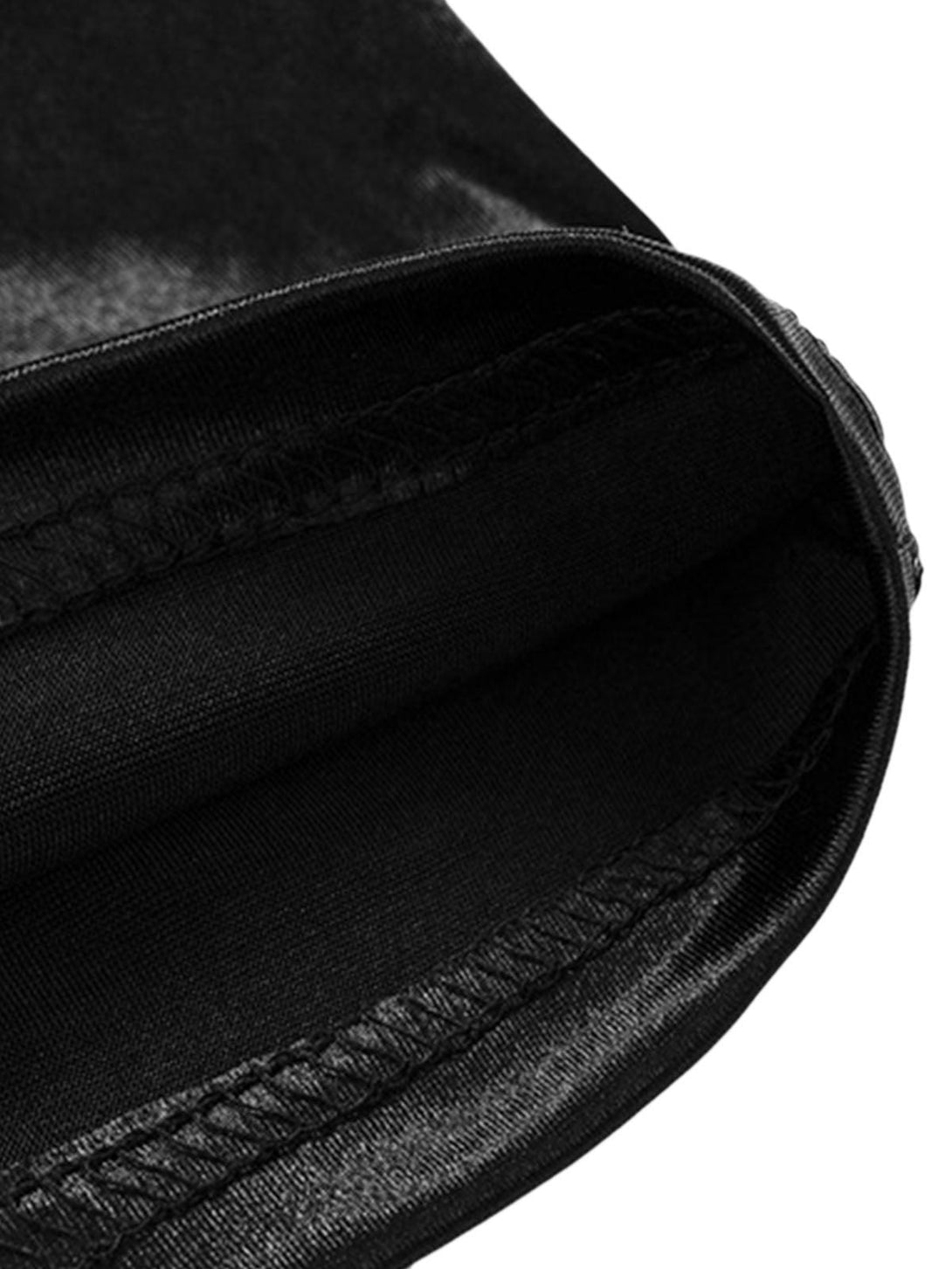 Detailed stitching on TALISHKO's black jersey T-shirt, highlighting quality craftsmanship.